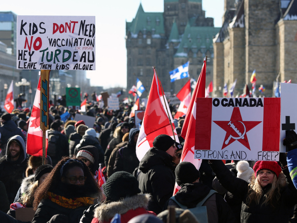 Featured image for “Canada Anti-Vaccine Protest Continues as Vandals Spark Anger”
